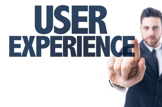 Business man pointing the text User Experience